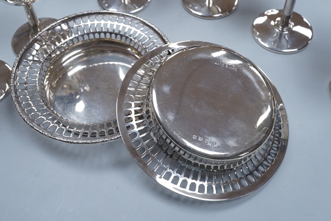 A pair of George VI silver bonbon dishes, by Davis, Duff & Son Birmingham, 1937, diameter 12.3cm, together with a set of six continental plated flutes.